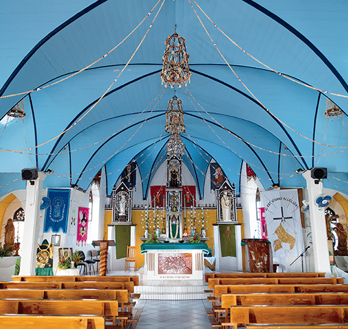 Photo of the interior of a church in French Polynesia.