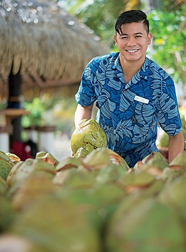 Man with coconuts