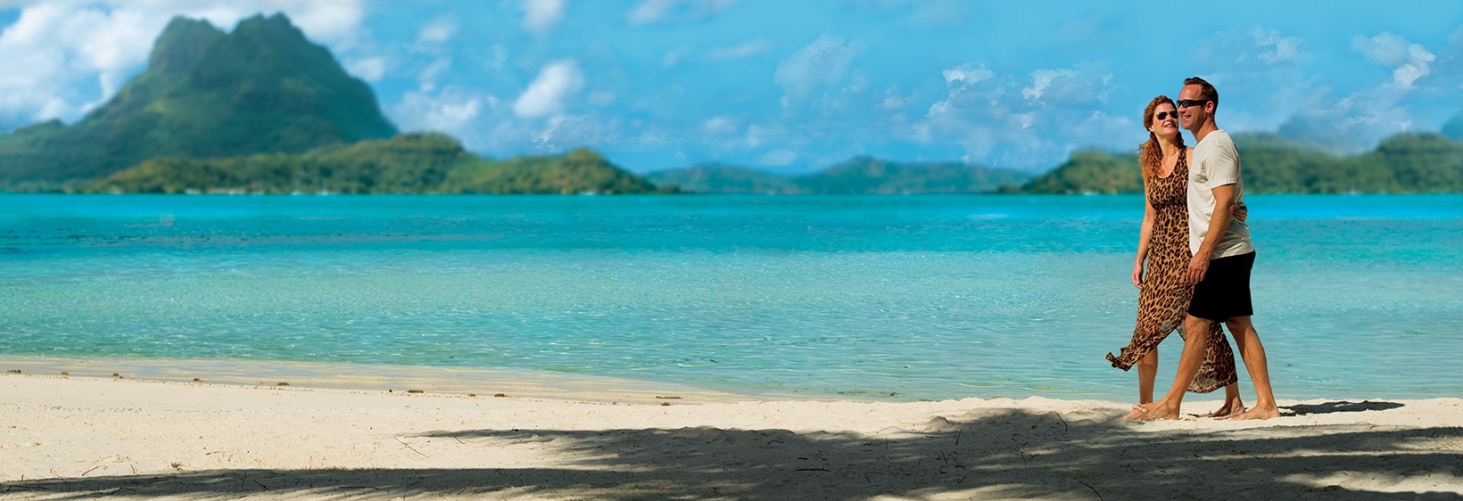 Couple going for a walk on the beach