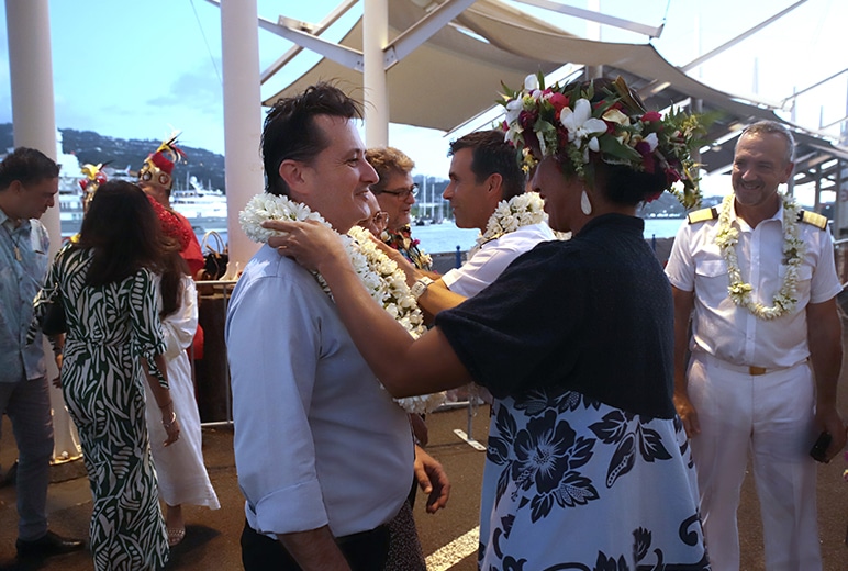 French Polynesia Minister of Health Cédric Mercadal is welcomed aboard The Gauguin with a traditional lei.